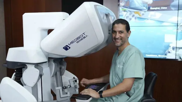 A Muslim Doctor Dr Youness Ahallal achieves Historic Milestone with World’s First Intercontinental Robotic Surgery